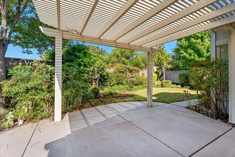 a view of backyard with green space