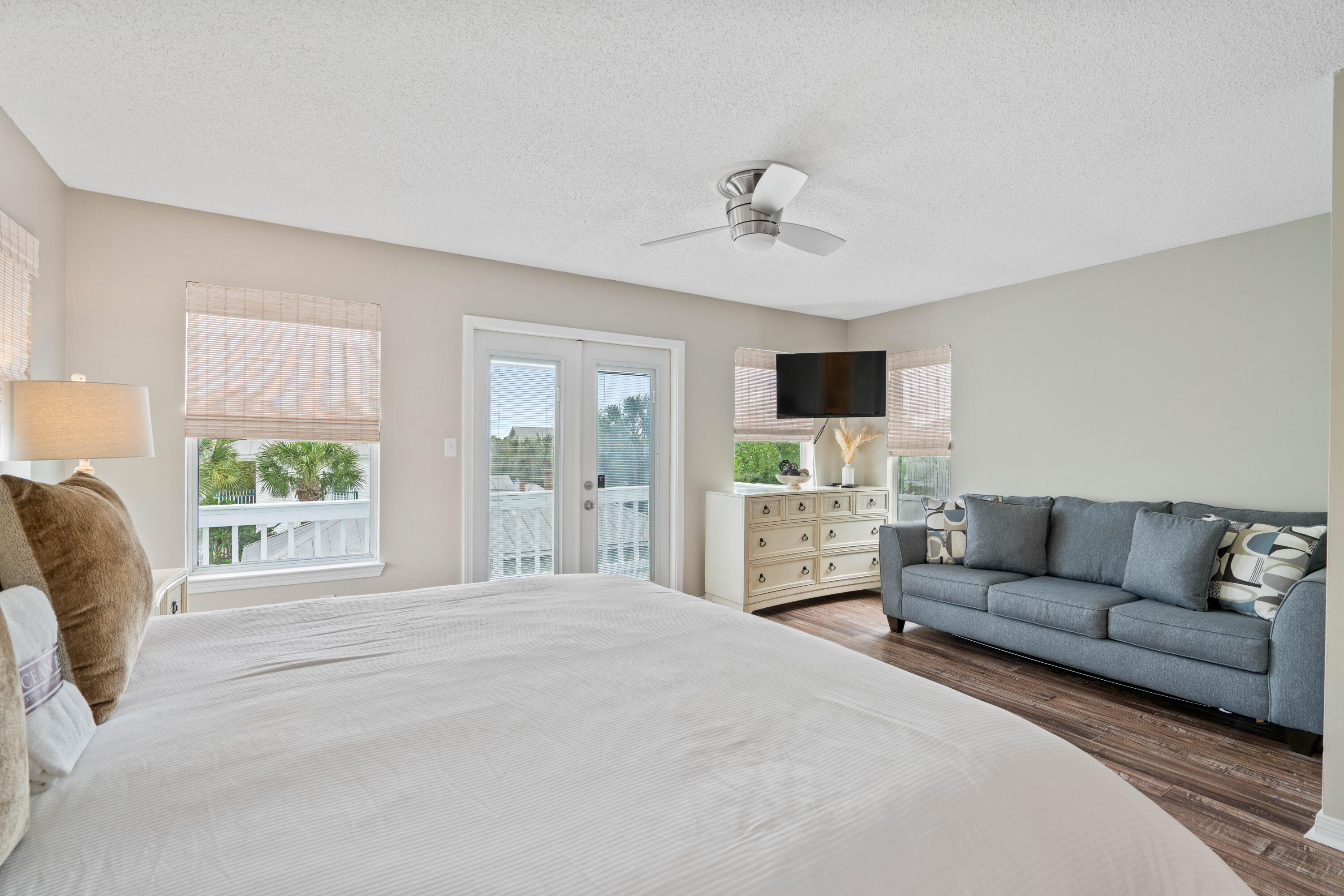 4508 Luke Avenue Destin, FL 32541 - Photo 19 of 48 a living room with furniture flat screen tv and a fireplace