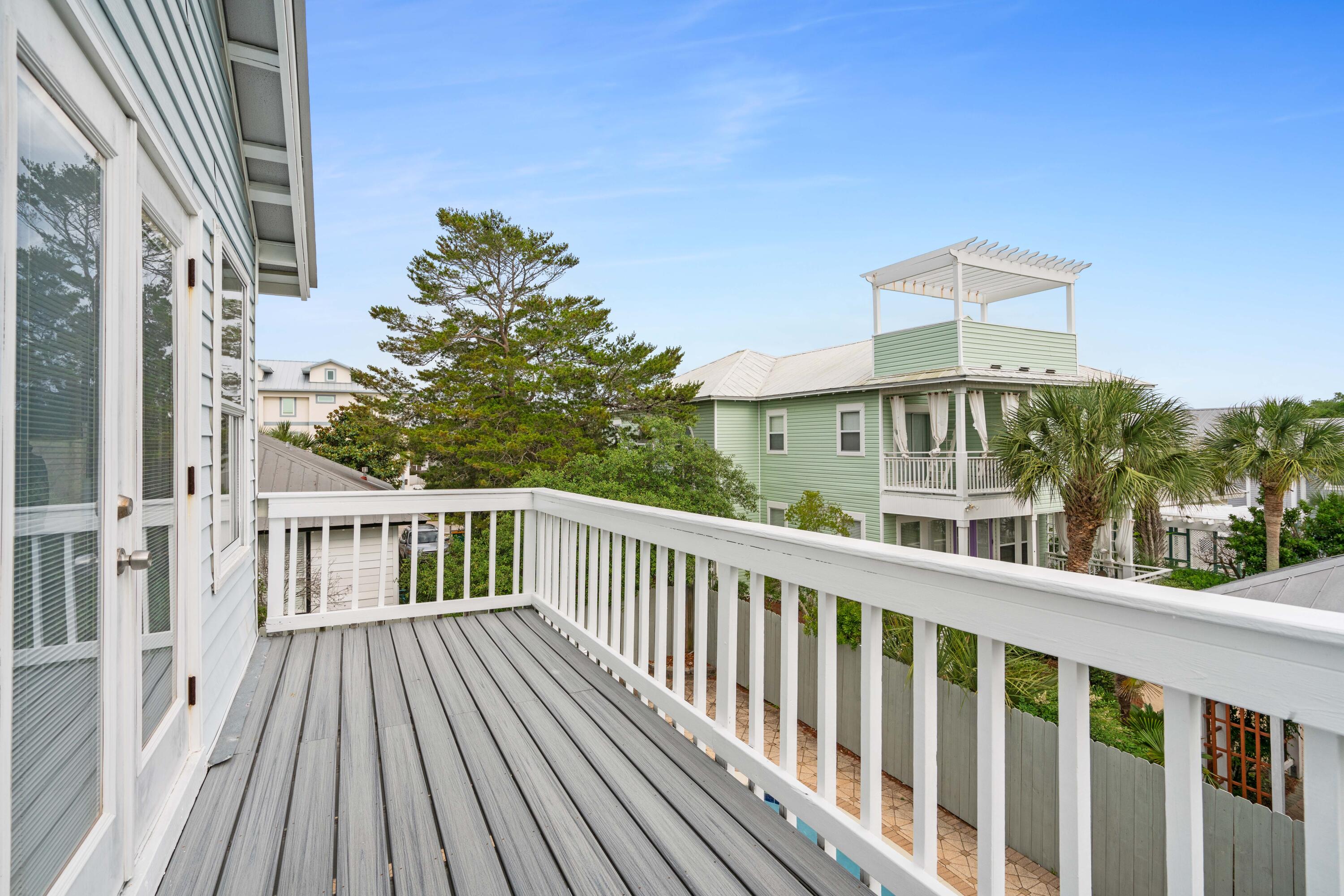 4508 Luke Avenue Destin, FL 32541 - Photo 22 of 48 a view of a balcony with wooden floor and fence
