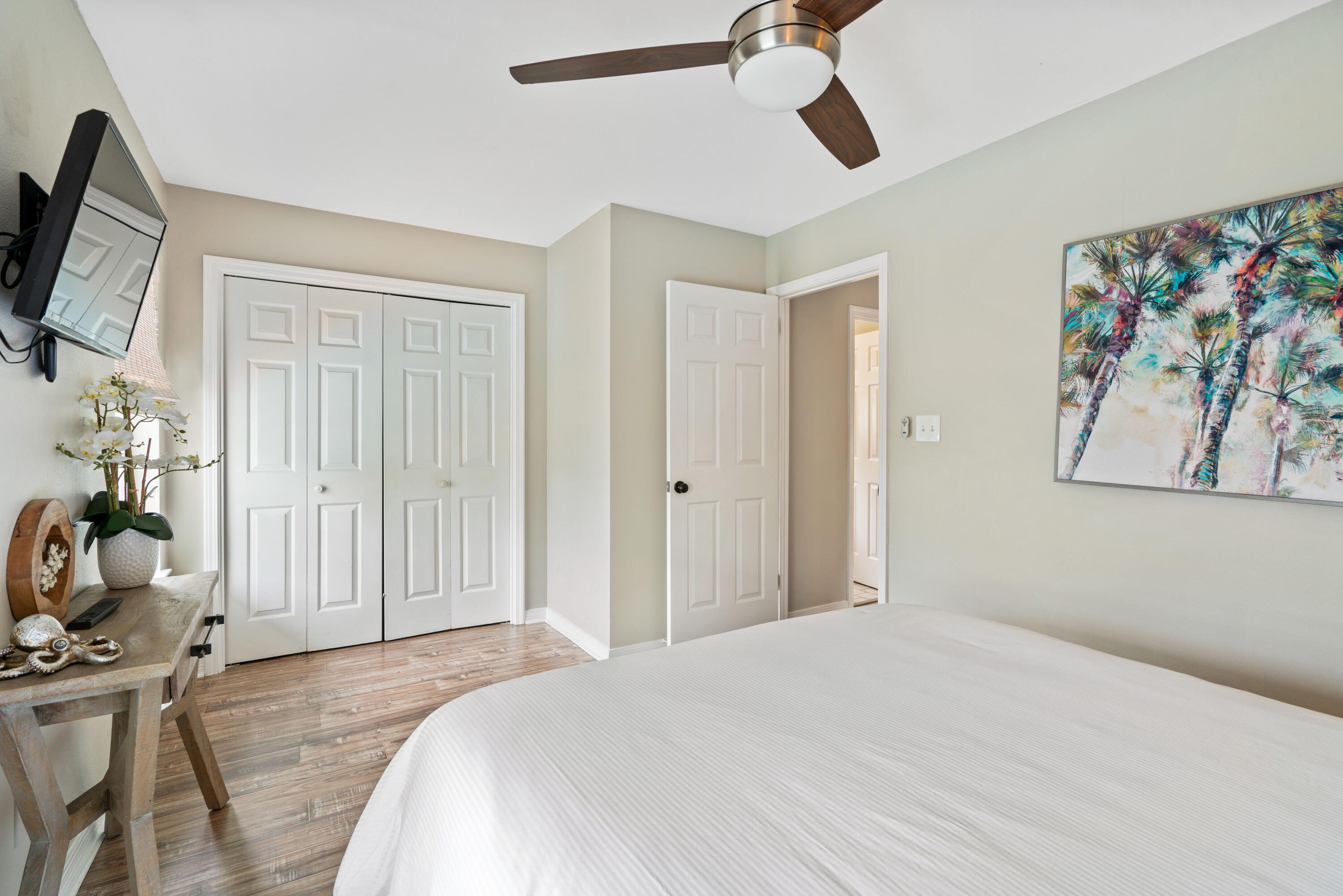 4508 Luke Avenue Destin, FL 32541 - Photo 31 of 48 a bedroom with a bed and a flat tv screen on the dresser