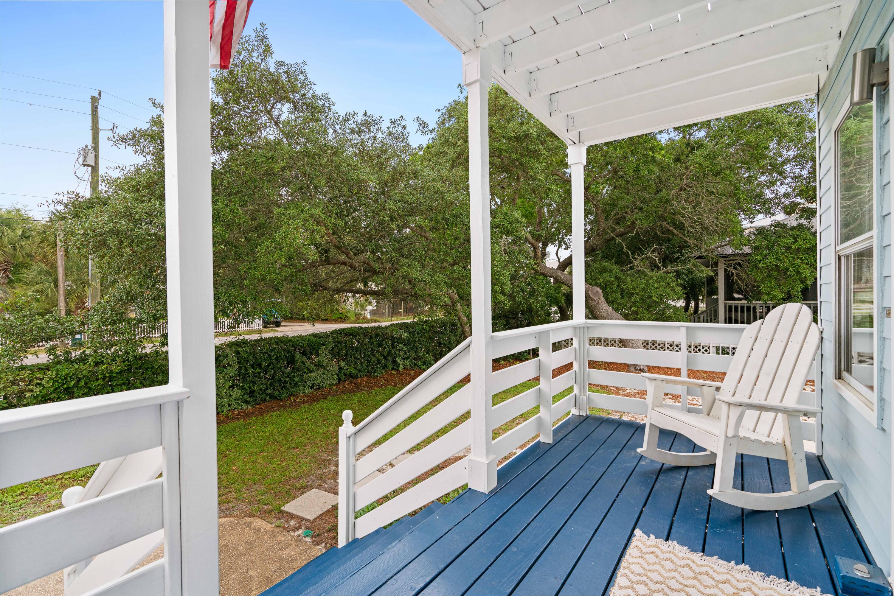 4508 Luke Avenue Destin, FL 32541 - Photo 38 of 48 a view of balcony with wooden floor and outdoor seating