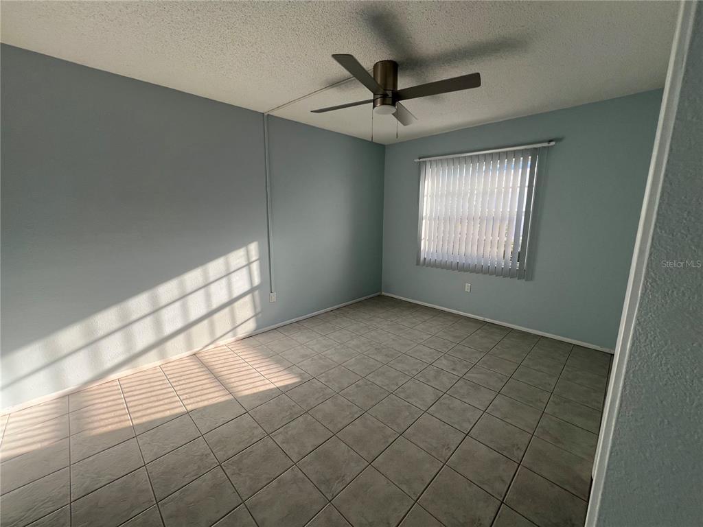 810 Kings Court, Unit D Punta Gorda, FL 33950 - Photo 9 of 10 a view of an empty room and window
