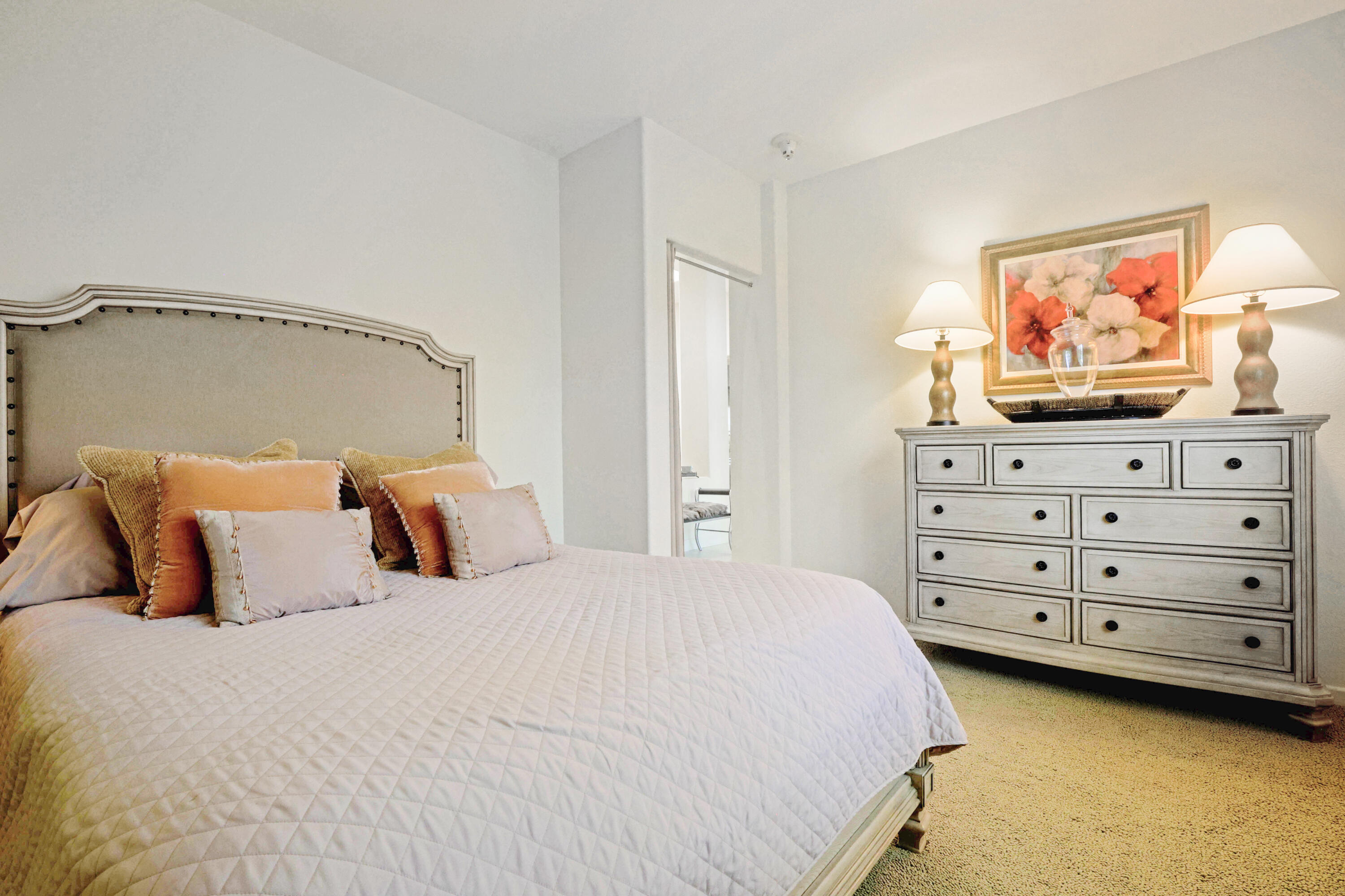 371 Indian Ridge Drive Palm Desert, CA 92211 - Photo 26 of 32 a bedroom with a bed and a cabinet