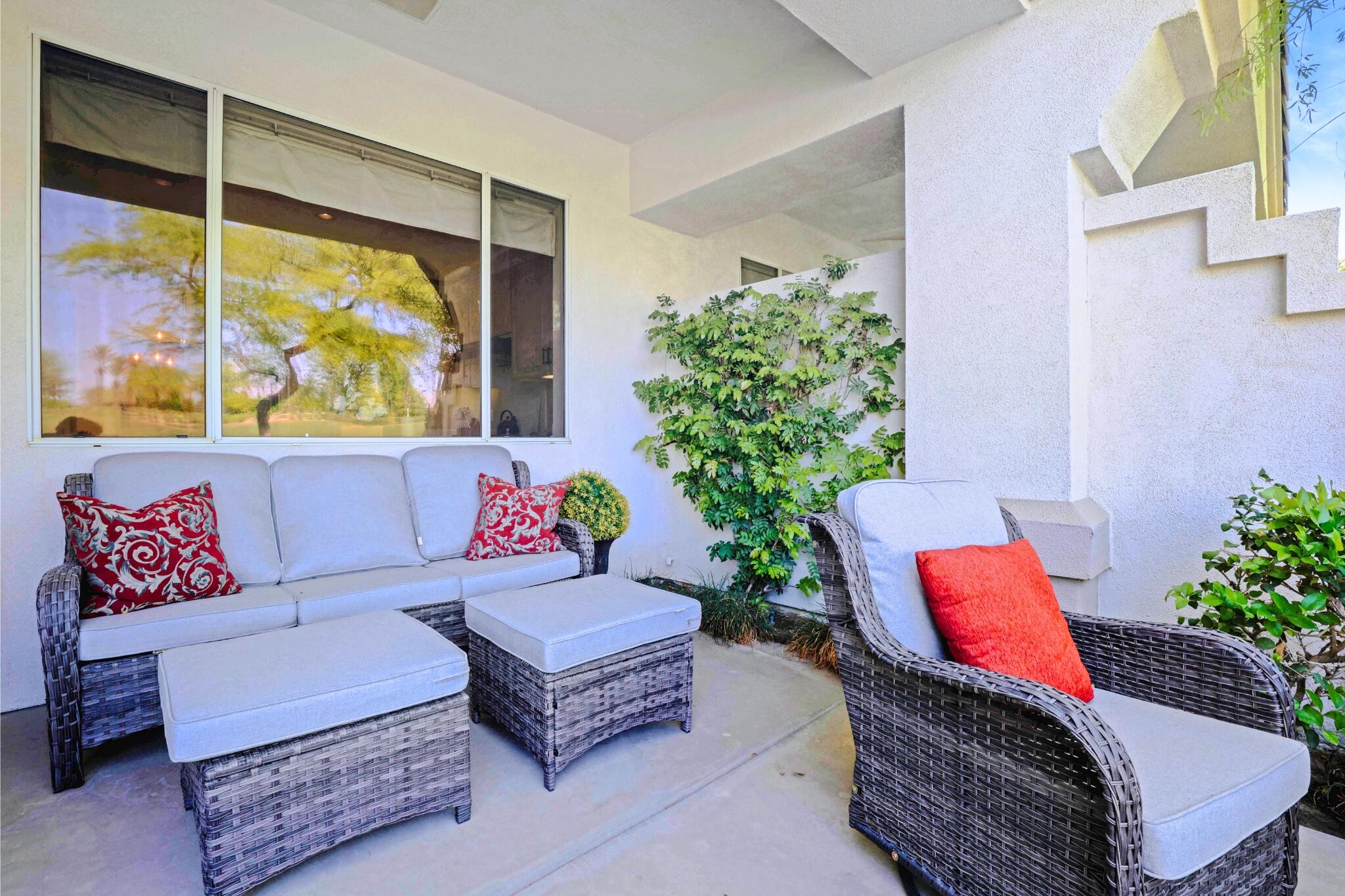 371 Indian Ridge Drive Palm Desert, CA 92211 - Photo 29 of 32 a living room with furniture and a large window