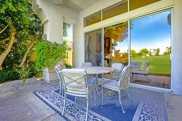 a view of a golf course with a lake