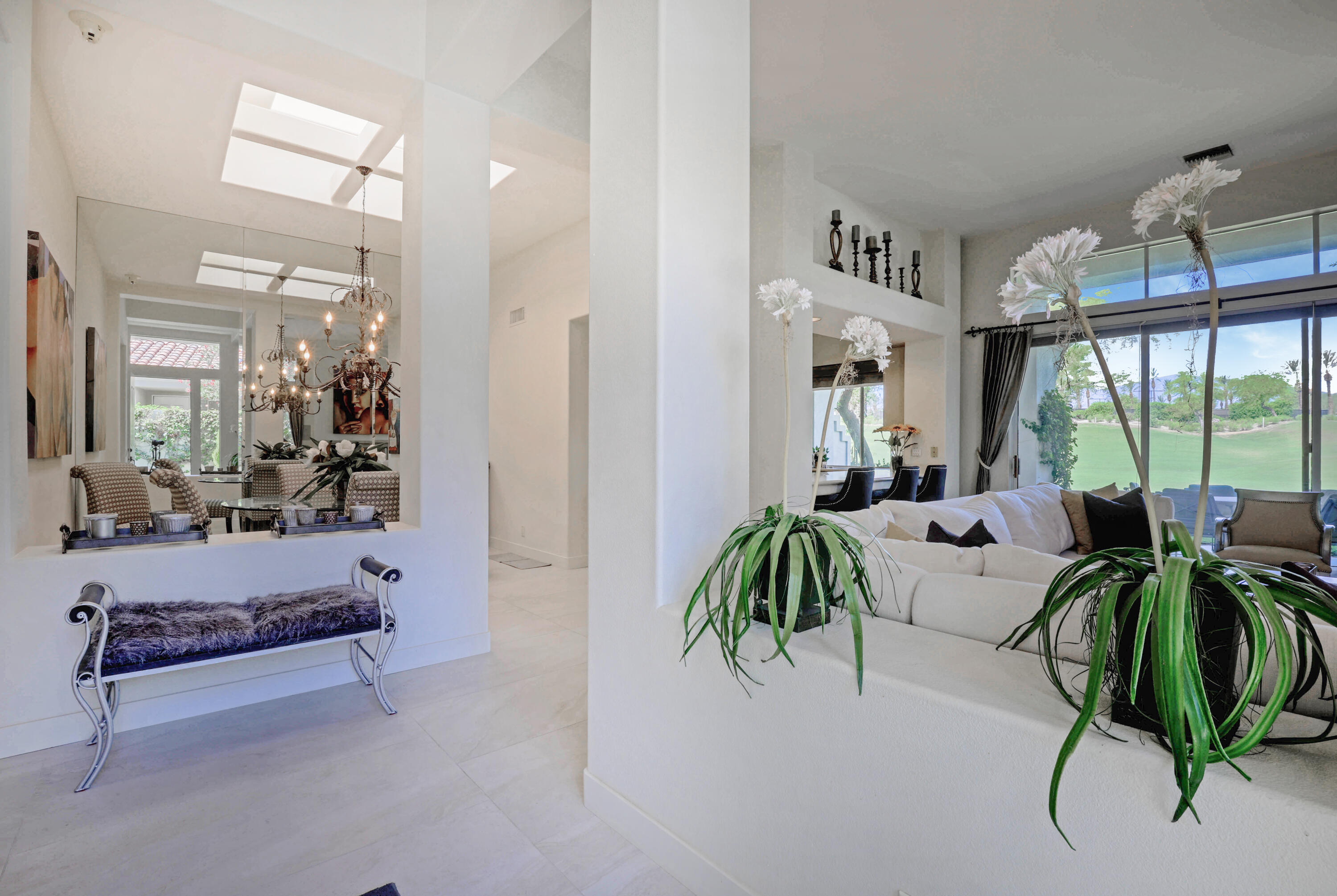 371 Indian Ridge Drive Palm Desert, CA 92211 - Photo 6 of 32 a living room with furniture and a large window