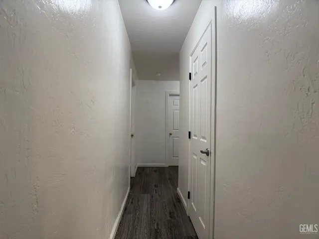 a view of a bathroom from a hallway