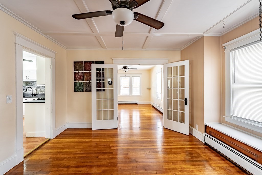 48 Rimmon Avenue Chicopee, MA 01013 - Photo 11 of 41 a view of a room with wooden floor and windows
