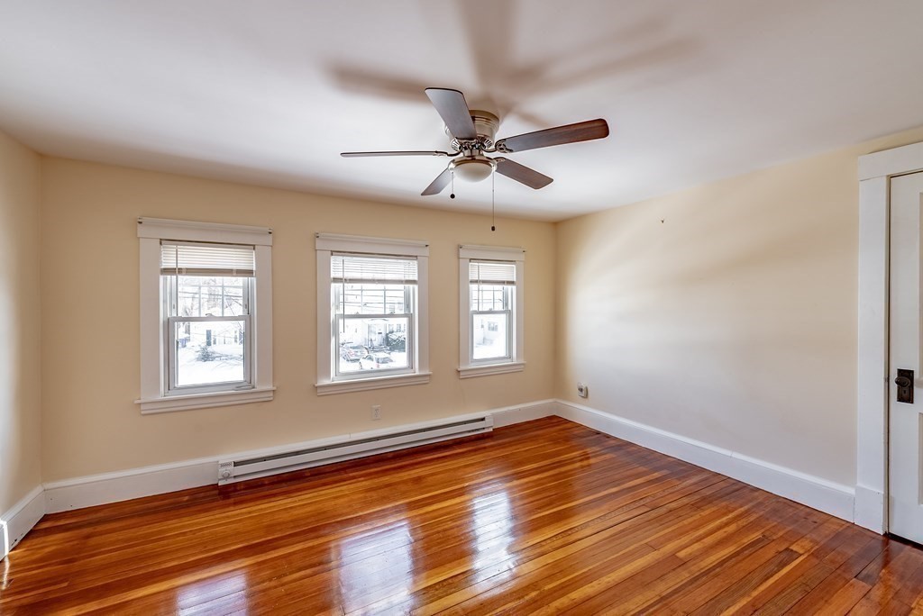 48 Rimmon Avenue Chicopee, MA 01013 - Photo 19 of 41 a view of an empty room with wooden floor and a window