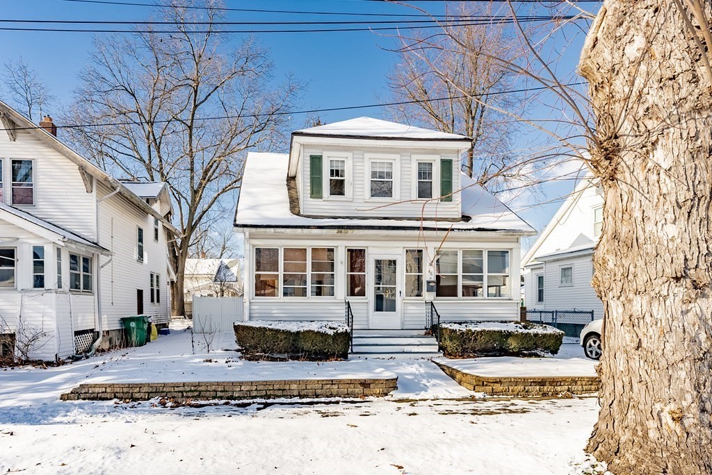 48 Rimmon Avenue Chicopee, MA 01013 - Photo 2 of 41 a front view of a house with a yard covered in snow