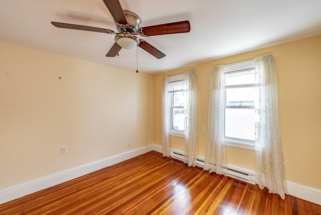 48 Rimmon Avenue Chicopee, MA 01013 - Photo 23 of 41 a view of room with window and wooden floor