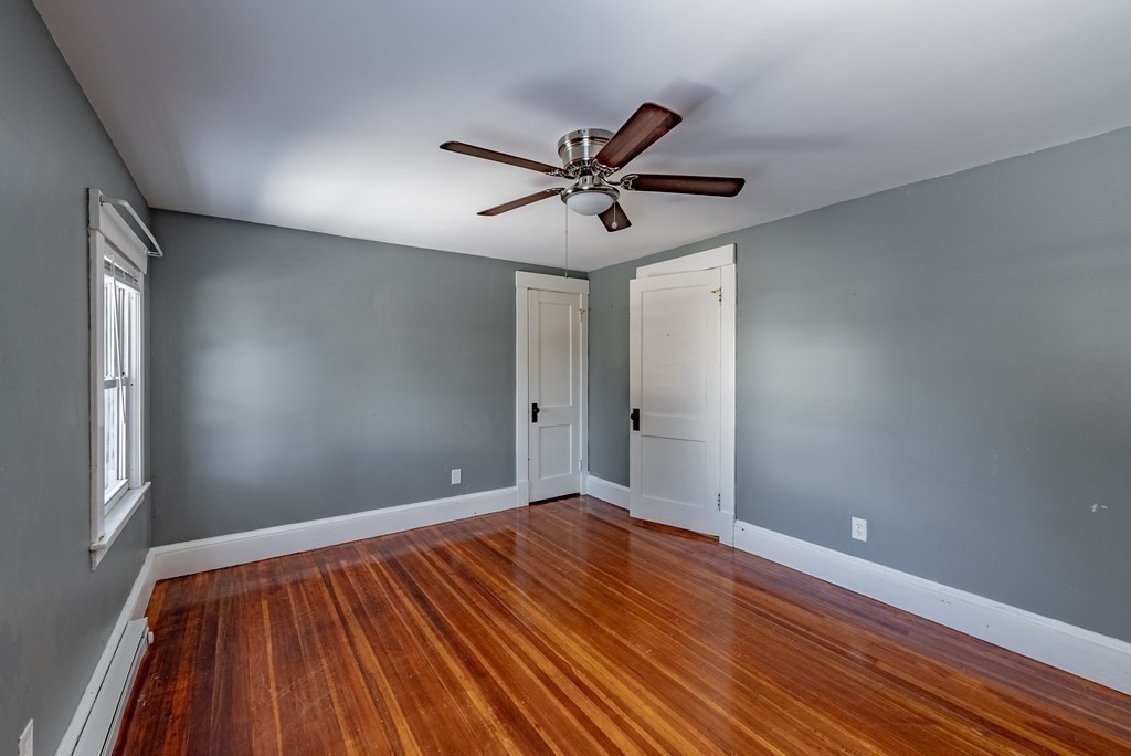 48 Rimmon Avenue Chicopee, MA 01013 - Photo 27 of 41 a view of room with hardwood floor and a ceiling fan