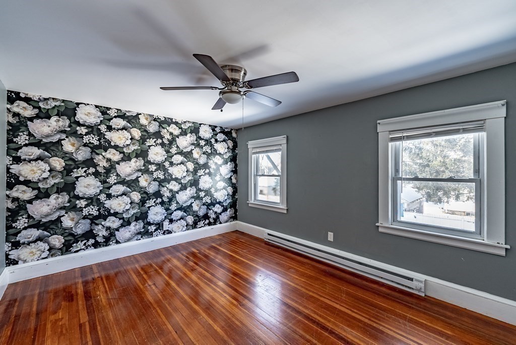 48 Rimmon Avenue Chicopee, MA 01013 - Photo 28 of 41 wooden floor in an empty room with a window