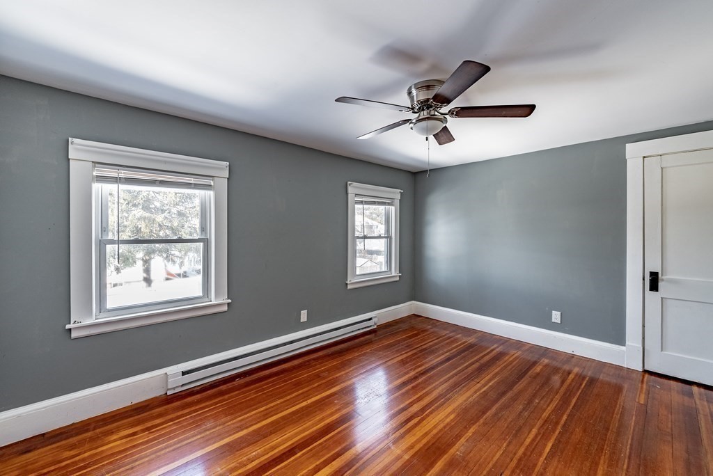 48 Rimmon Avenue Chicopee, MA 01013 - Photo 29 of 41 a view of empty room with wooden floor and fan
