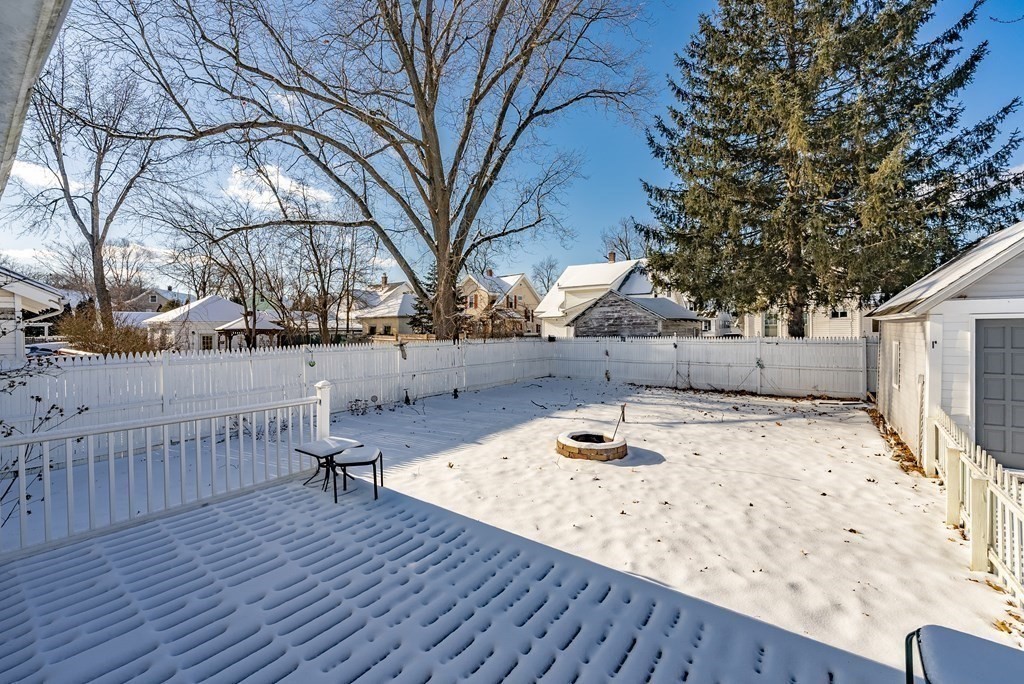 48 Rimmon Avenue Chicopee, MA 01013 - Photo 37 of 41 a view of a backyard with wooden fence