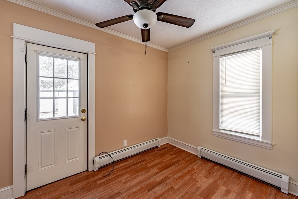 48 Rimmon Avenue Chicopee, MA 01013 - Photo 6 of 41 a view of an empty room with wooden floor and a window