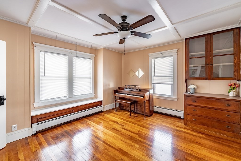 48 Rimmon Avenue Chicopee, MA 01013 - Photo 8 of 41 a work room with wooden floor and furniture