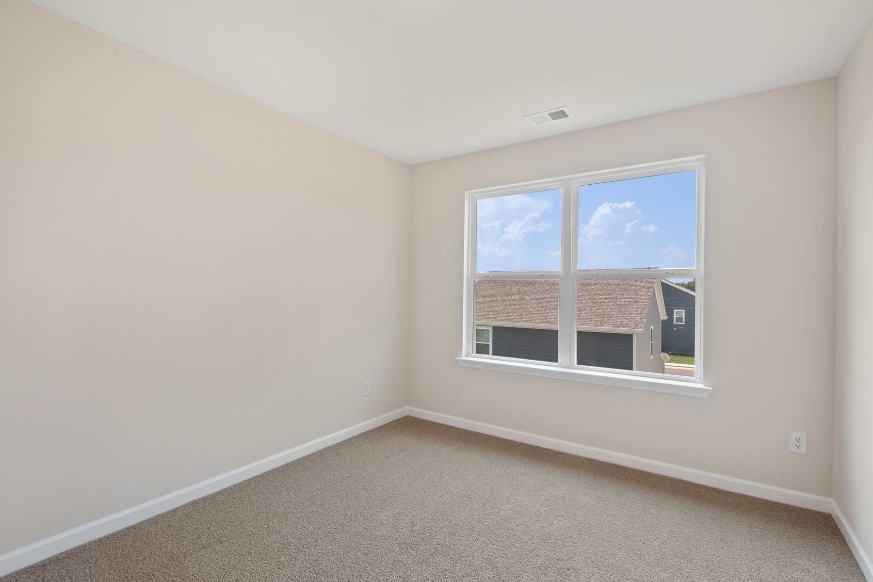 6077 Cullen Drive La Vergne, TN 37086 - Photo 5 of 7 a view of an empty room with a window