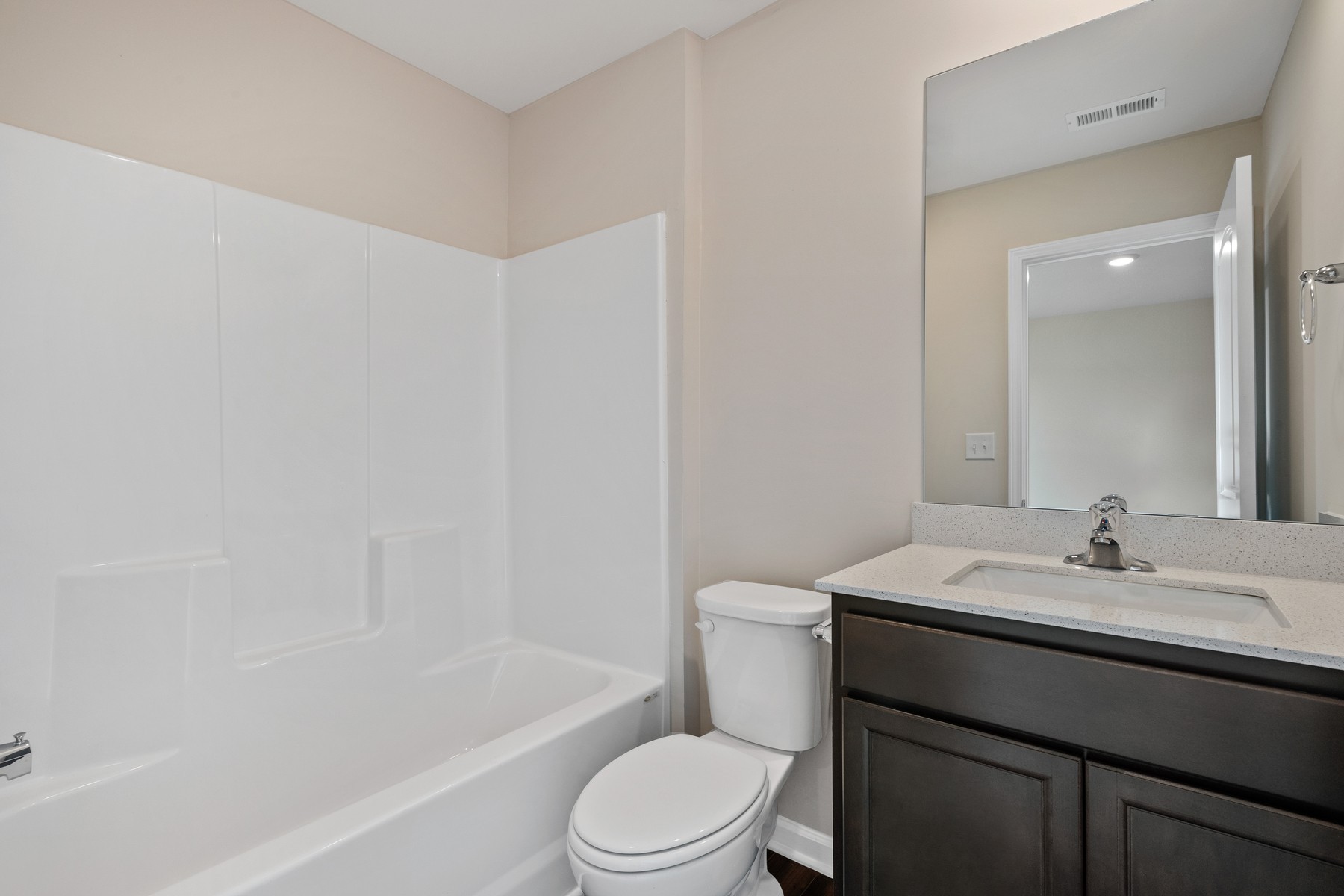 6077 Cullen Drive La Vergne, TN 37086 - Photo 7 of 7 a bathroom with a sink a toilet and bathtub