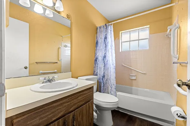 a view of a bathroom from the hallway