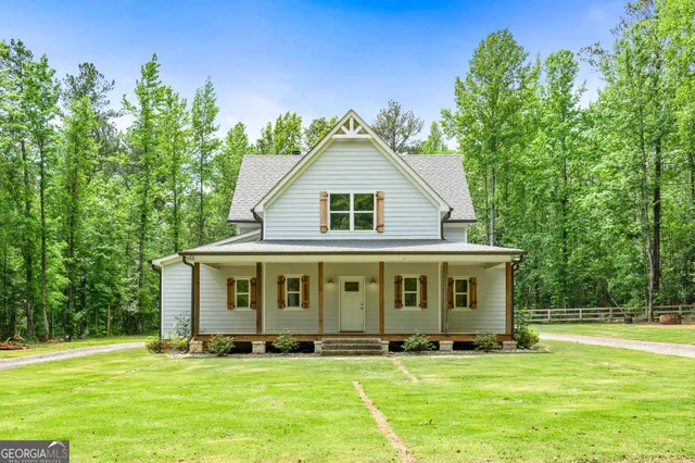 a view of a house with a swimming pool
