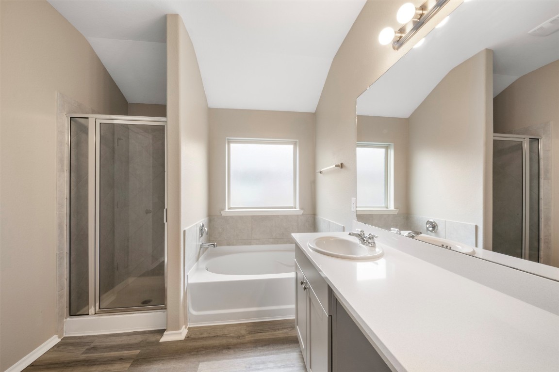 175 Courageous Side Way Magnolia, TX 77354 - Photo 18 of 28 a bathroom with a tub sink and shower