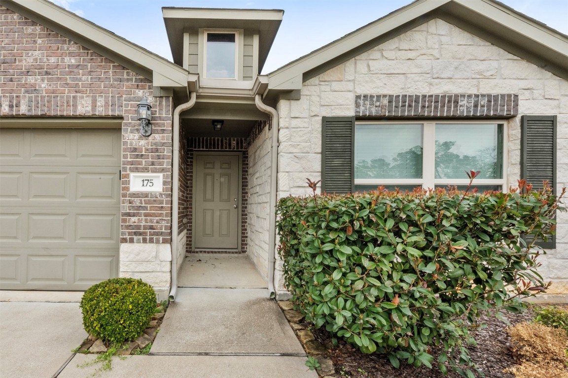 175 Courageous Side Way Magnolia, TX 77354 - Photo 2 of 28 a front view of a house