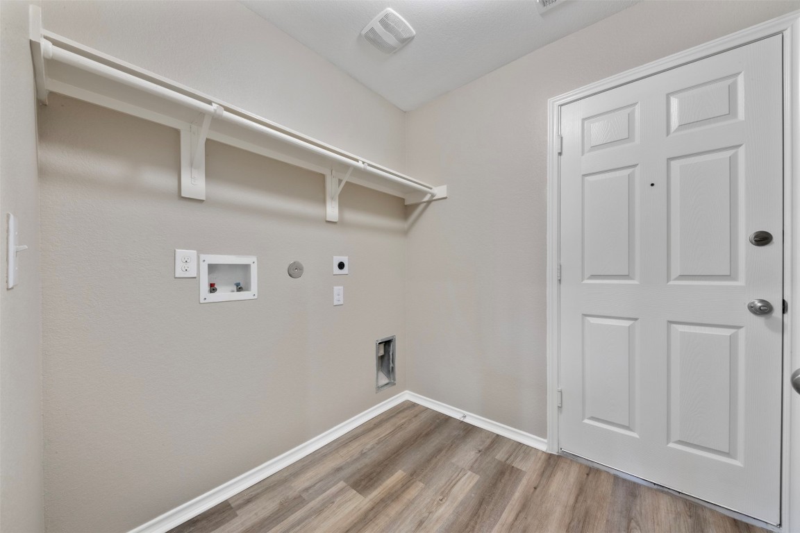 175 Courageous Side Way Magnolia, TX 77354 - Photo 25 of 28 a view of small space with racks on the wall