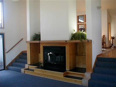 2449 Burnside Road Sebastopol, CA 95472 - Photo 4 of 7 a living room with furniture and a fireplace