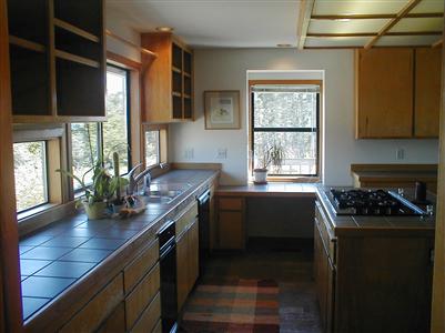 2449 Burnside Road Sebastopol, CA 95472 - Photo 5 of 7 a kitchen with a counter top space a sink a window and appliances