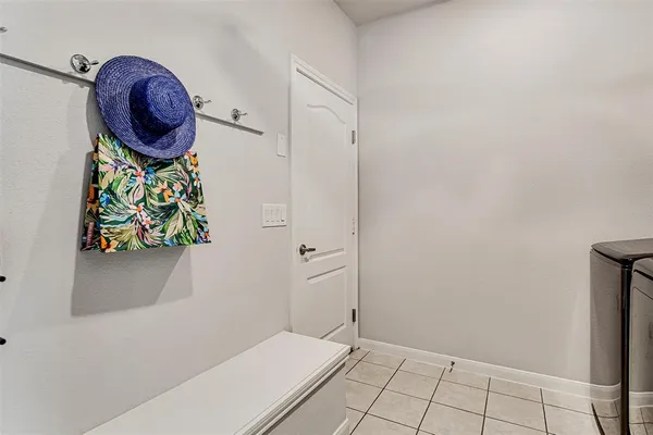 a view of bathroom with a sink and a mirror