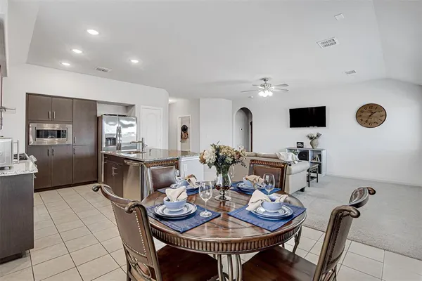 a view of a dining room with furniture