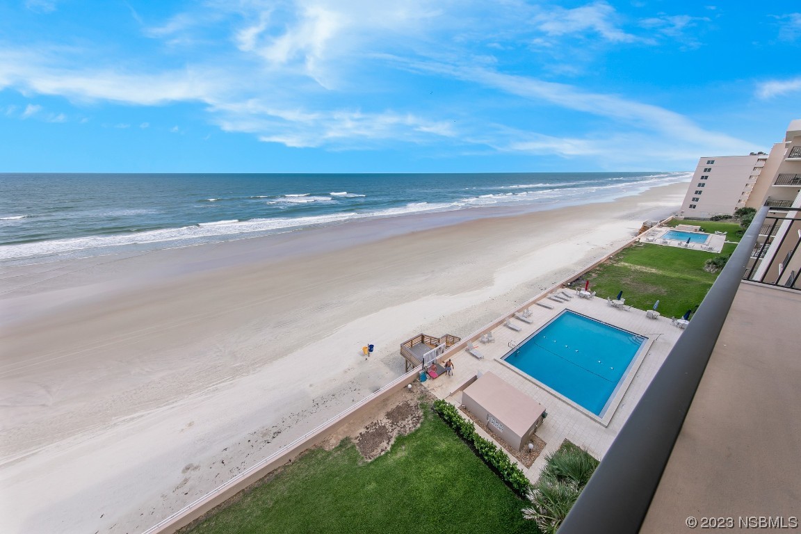 4435 South Atlantic Avenue, Unit 712 Ponce Inlet, FL 32127 - Photo 12 of 28 a view of an ocean and beach