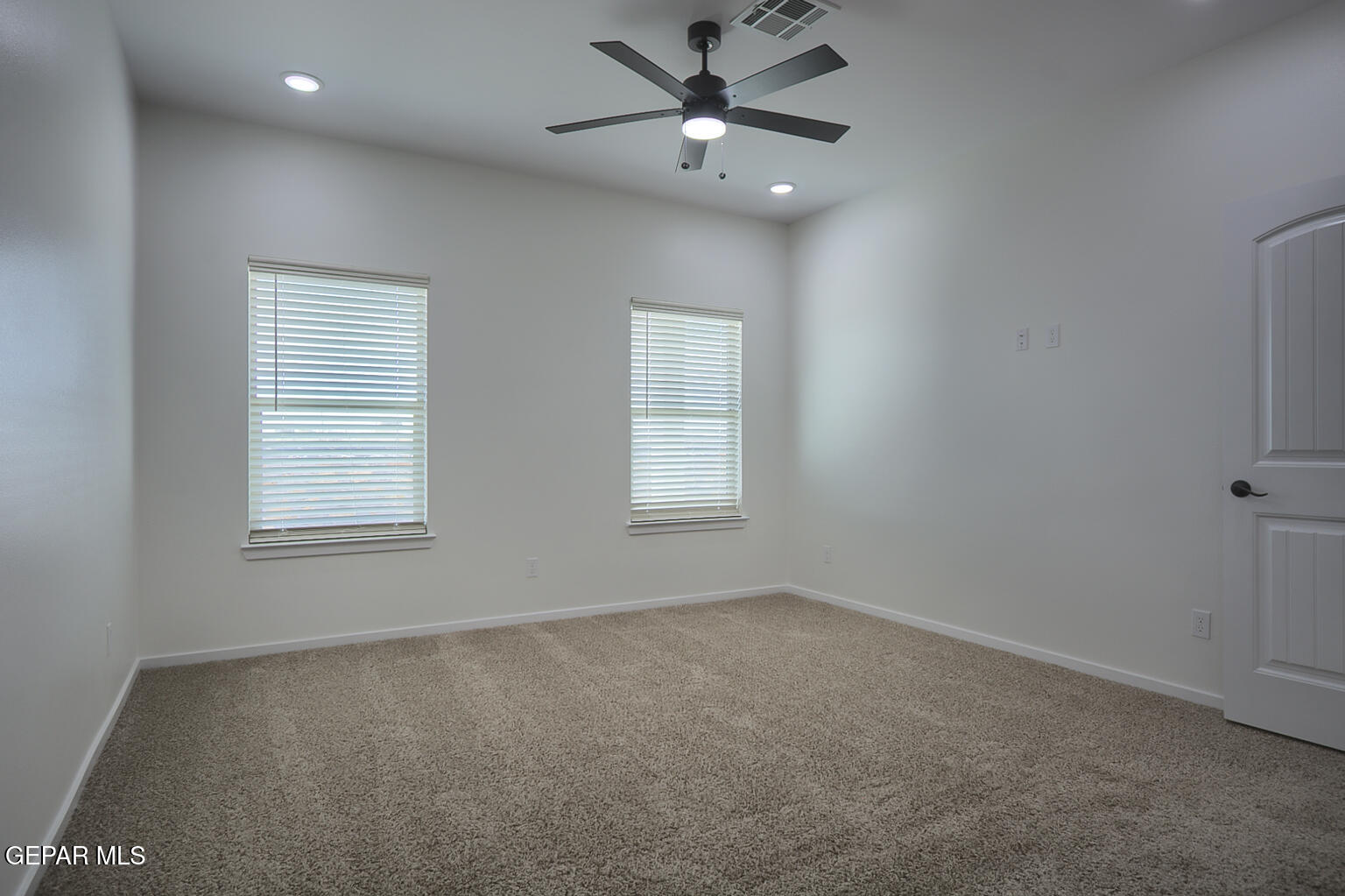 9913 Marisabel Socorro, TX 79927 - Photo 12 of 13 a view of an empty room with a window