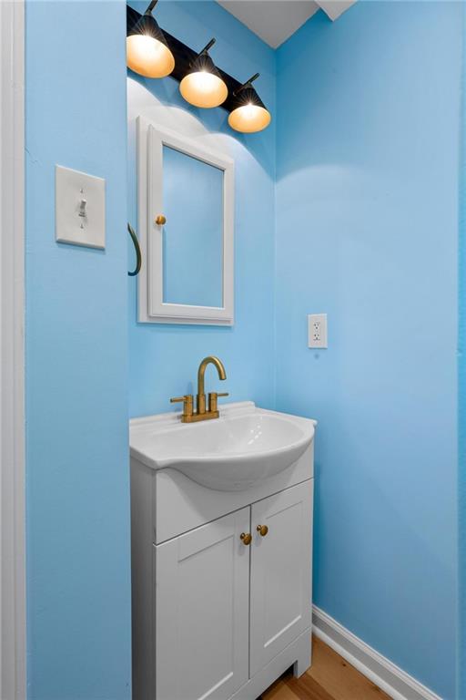 1745 Rockbridge Road Northwest Conyers, GA 30012 - Photo 9 of 32 a bathroom with a sink and a mirror
