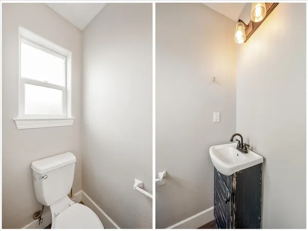 a bathroom with a sink mirror and toilet