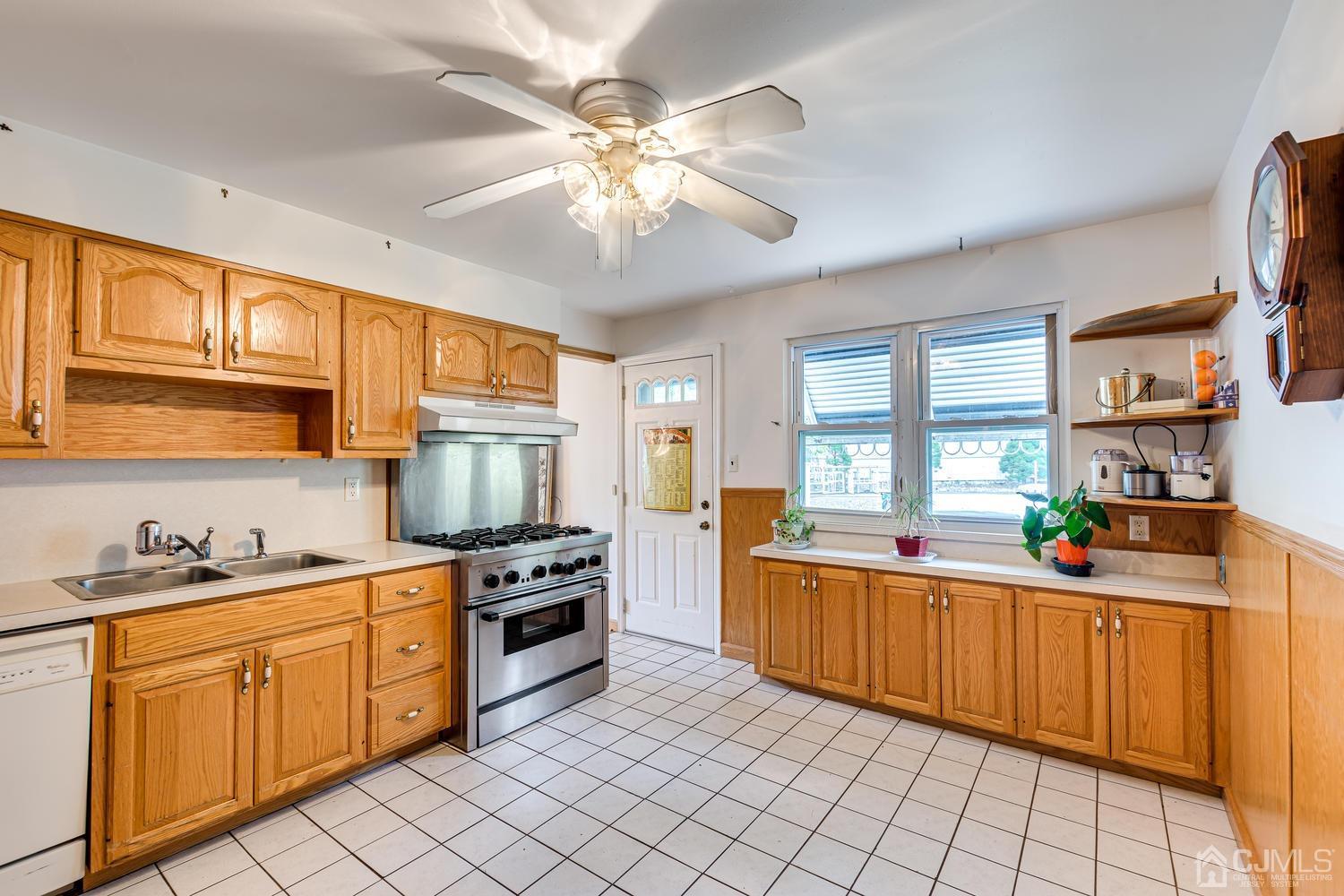 65 Drake Road Somerset, NJ 08873 - Photo 12 of 33 a kitchen with granite countertop appliances cabinets and a sink