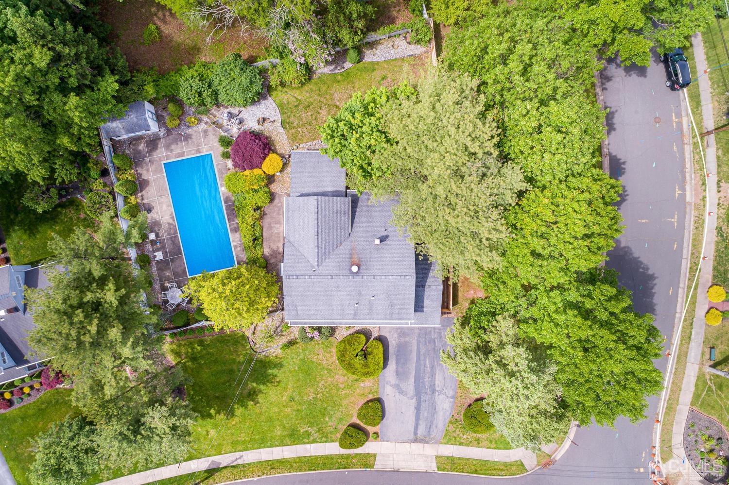 65 Drake Road Somerset, NJ 08873 - Photo 3 of 33 an aerial view of residential house with outdoor space and swimming pool