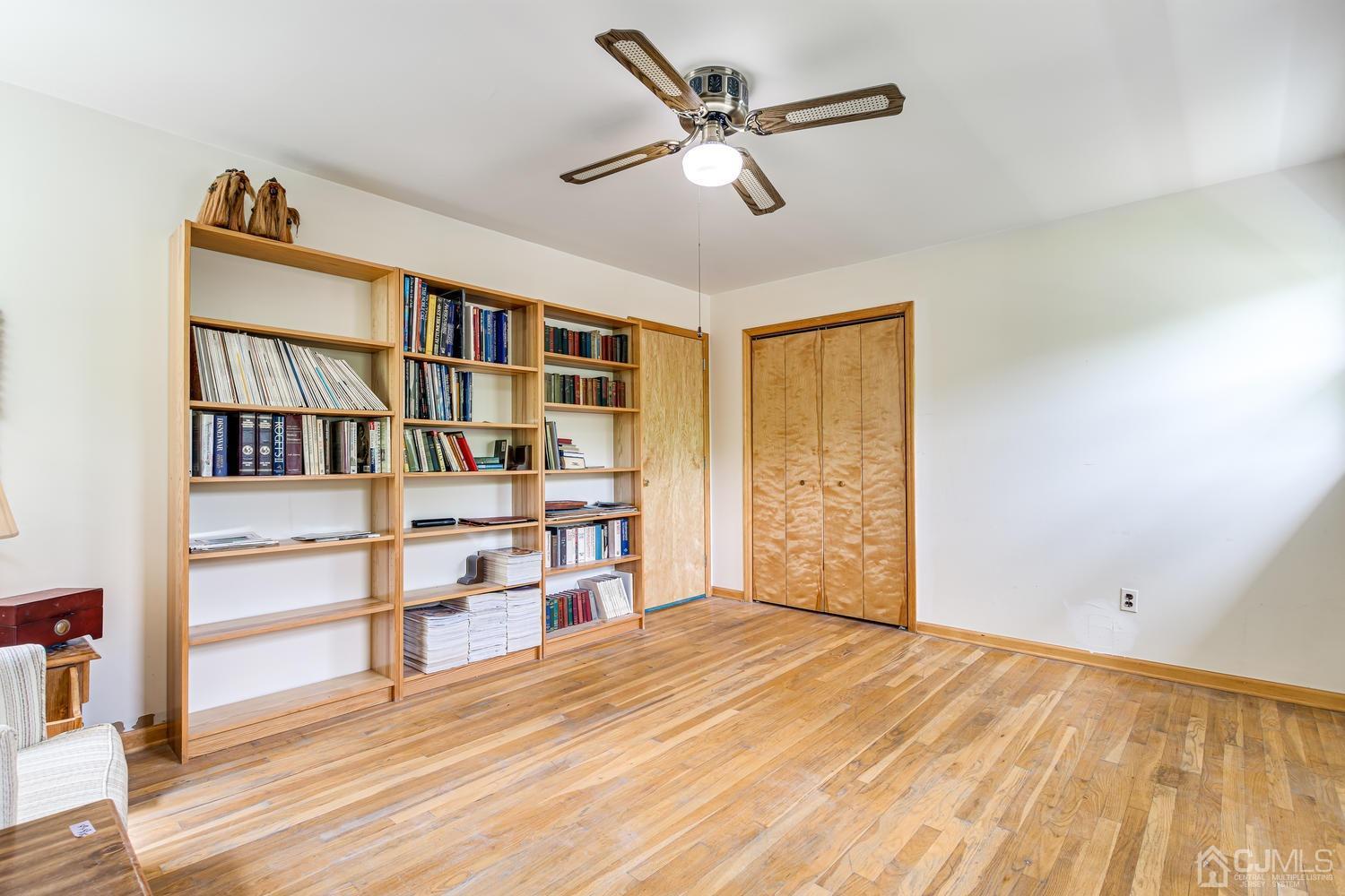 65 Drake Road Somerset, NJ 08873 - Photo 24 of 33 a view of empty room with wooden floor and fan