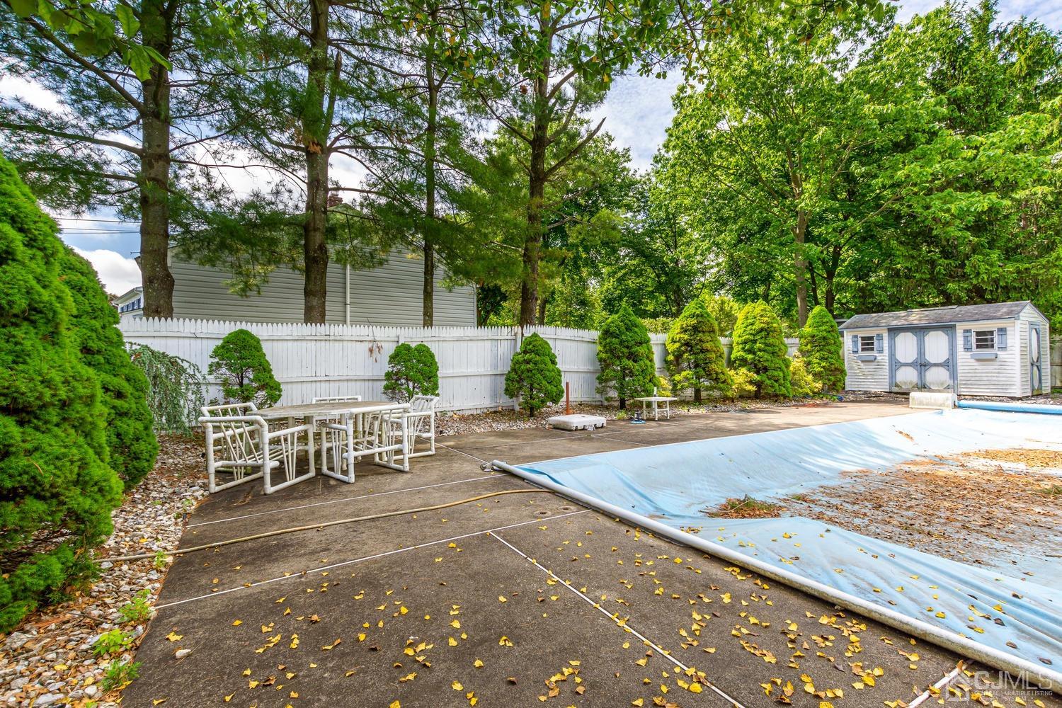 65 Drake Road Somerset, NJ 08873 - Photo 30 of 33 a view of a backyard with sitting area