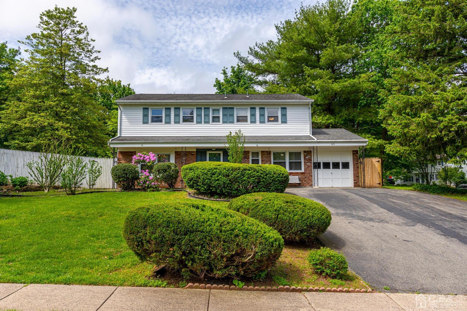 65 Drake Road Somerset, NJ 08873 - Photo 4 of 33 a front view of a house with garden
