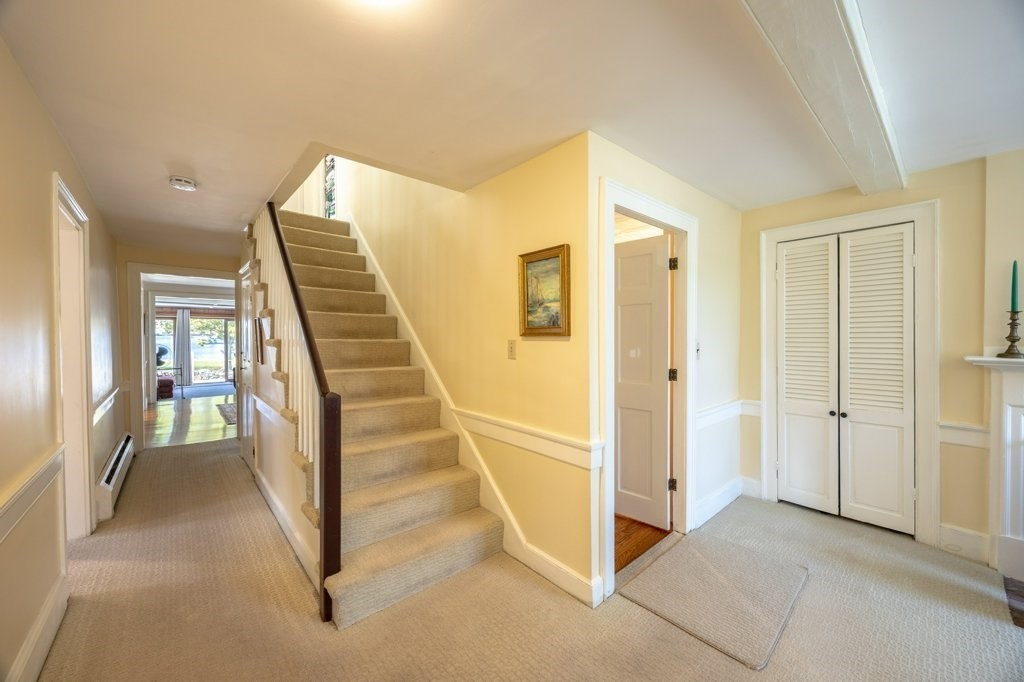 164 Main Street Fairhaven, MA 02719 - Photo 11 of 42 a view of entryway with furniture and stairs