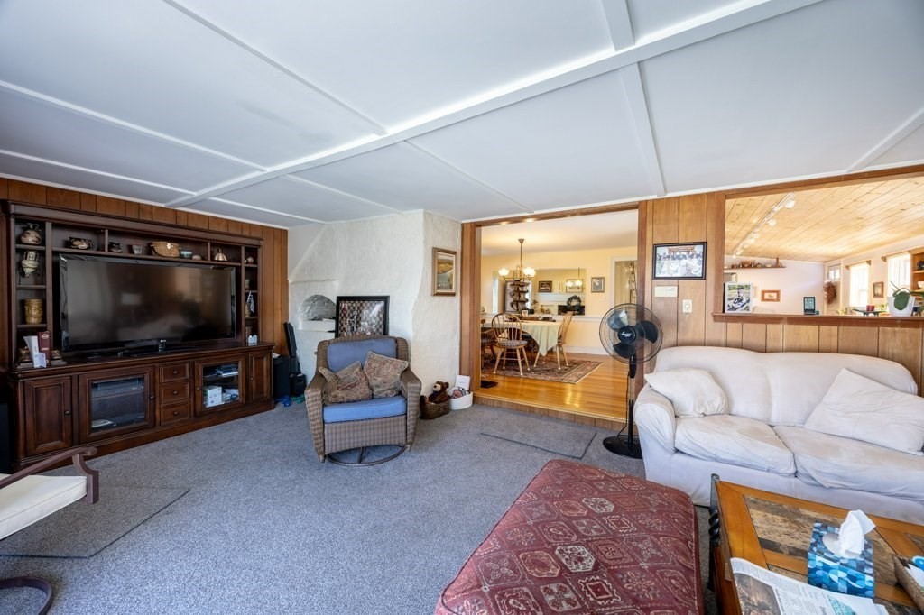 164 Main Street Fairhaven, MA 02719 - Photo 19 of 42 a living room with furniture and a flat screen tv