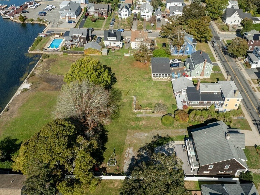 164 Main Street Fairhaven, MA 02719 - Photo 35 of 42 an aerial view of residential houses with outdoor space