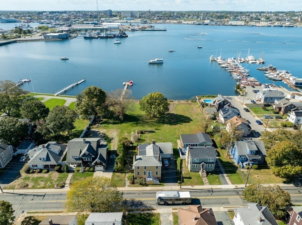 164 Main Street Fairhaven, MA 02719 - Photo 37 of 42 an aerial view of a house with a lake view