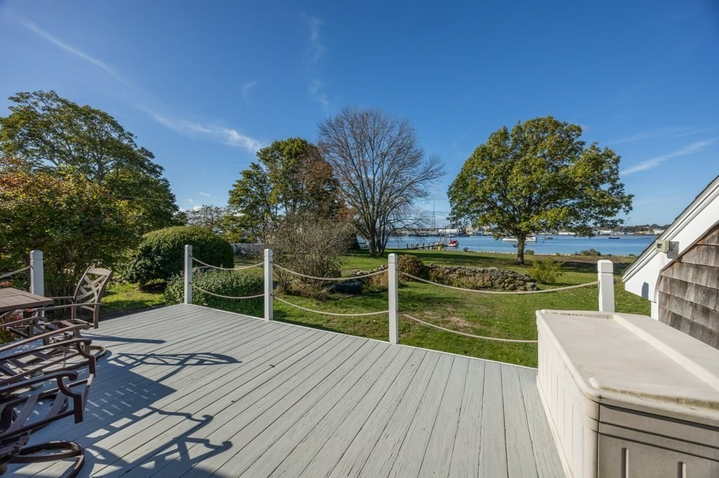 164 Main Street Fairhaven, MA 02719 - Photo 8 of 42 a view of a backyard with sitting area