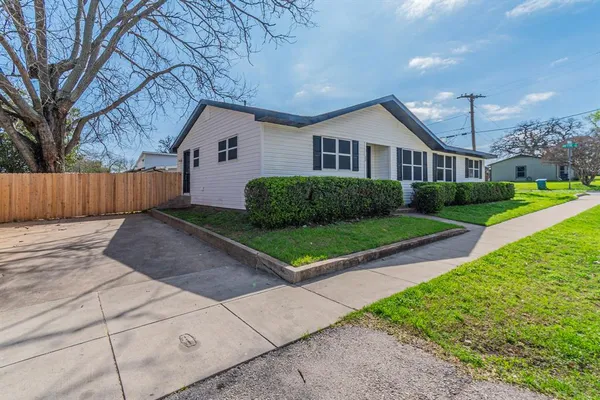 a house view with a garden space