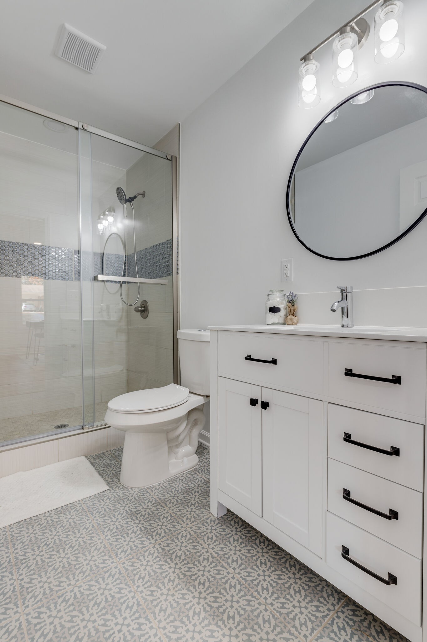 200 Shady Hill Road Dickson, TN 37055 - Photo 20 of 34 a bathroom with a toilet a sink and mirror
