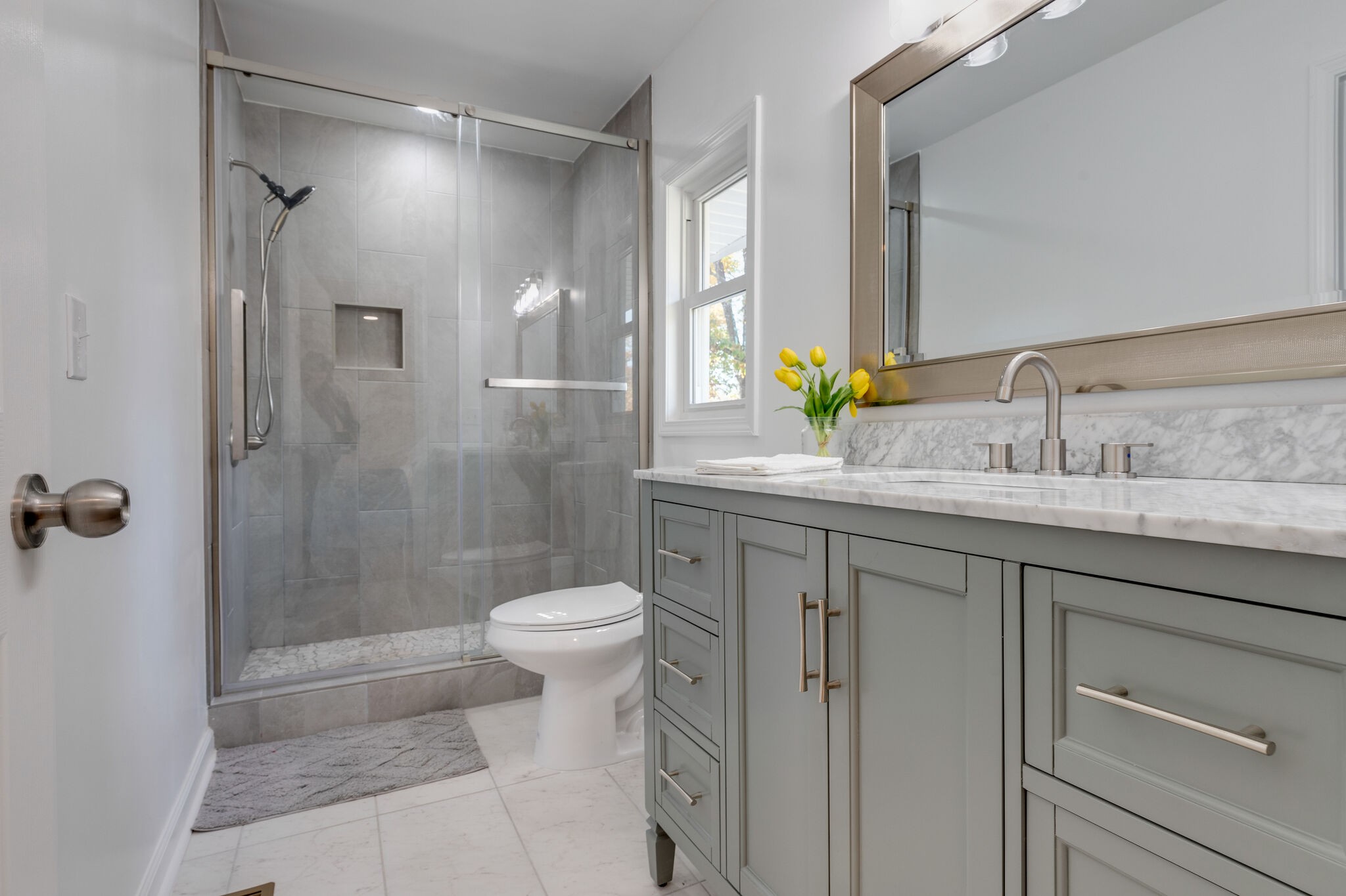 200 Shady Hill Road Dickson, TN 37055 - Photo 25 of 34 a bathroom with a shower sink vanity and toilet
