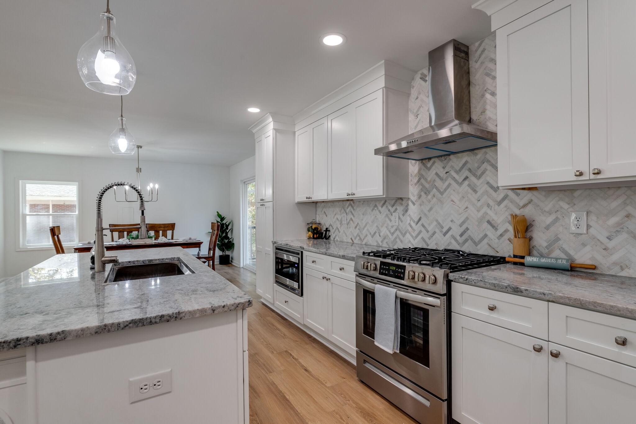 200 Shady Hill Road Dickson, TN 37055 - Photo 10 of 34 a kitchen with granite countertop a stove and a sink